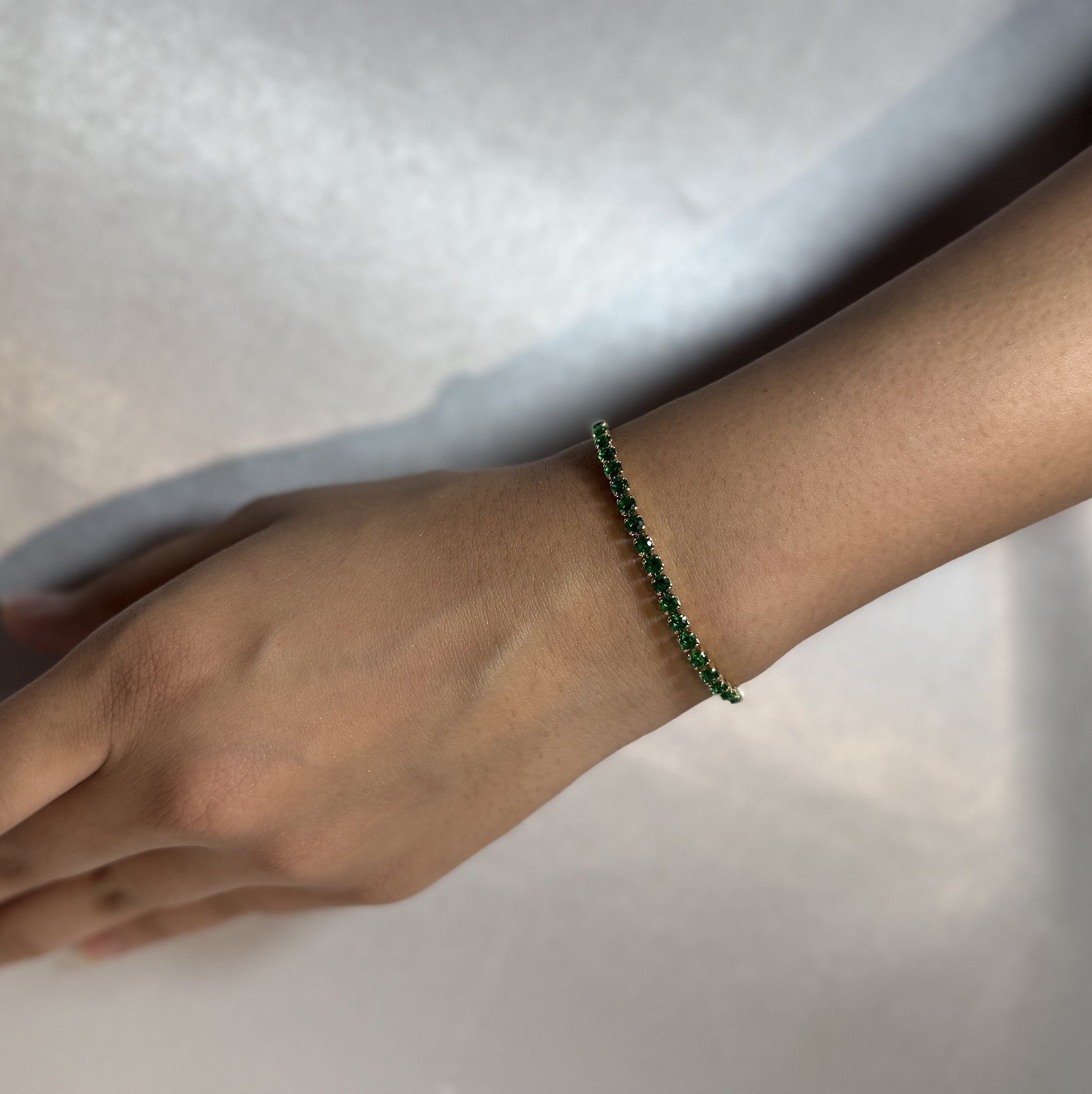 Green tennis bracelet