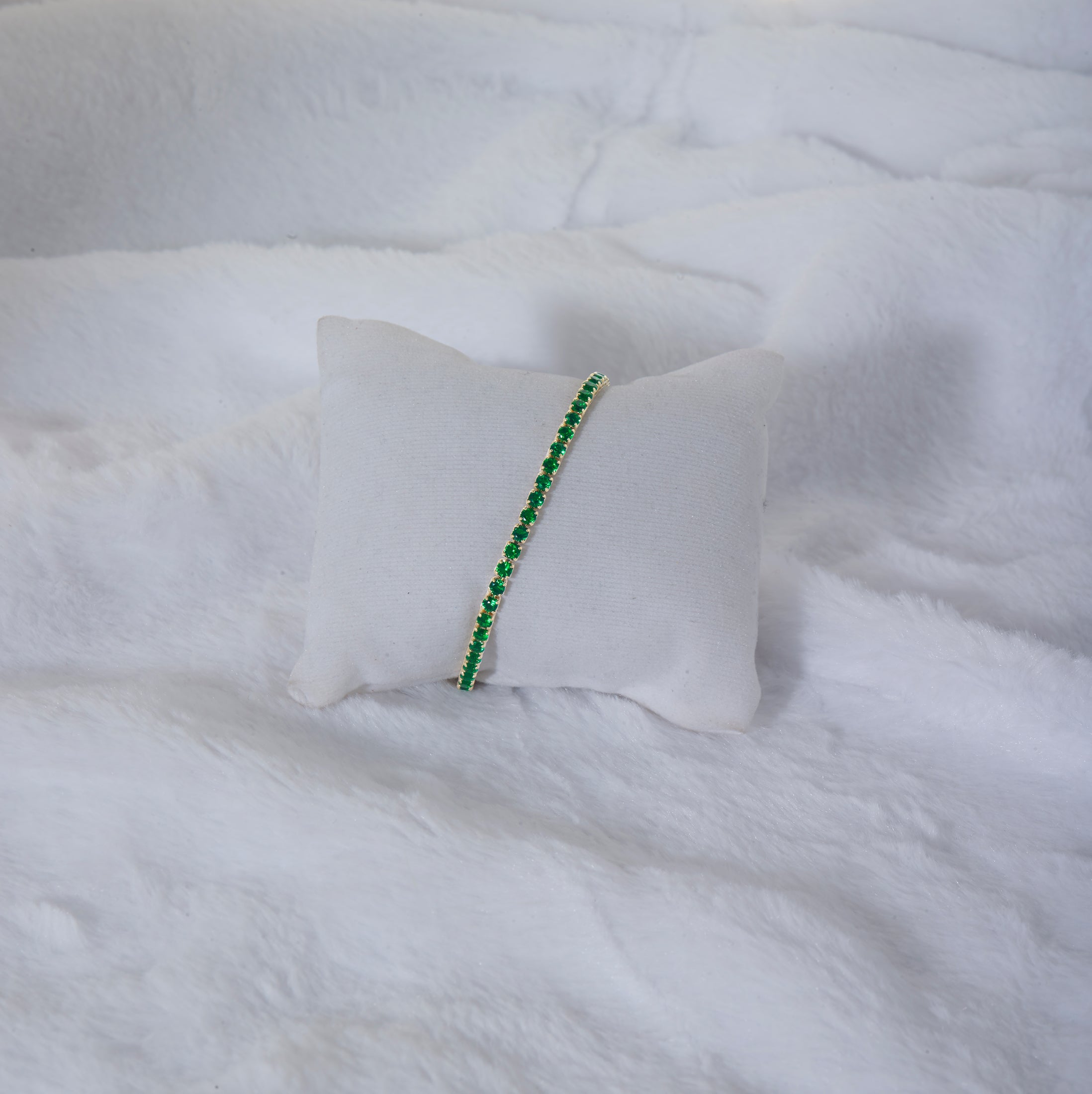 Green tennis bracelet