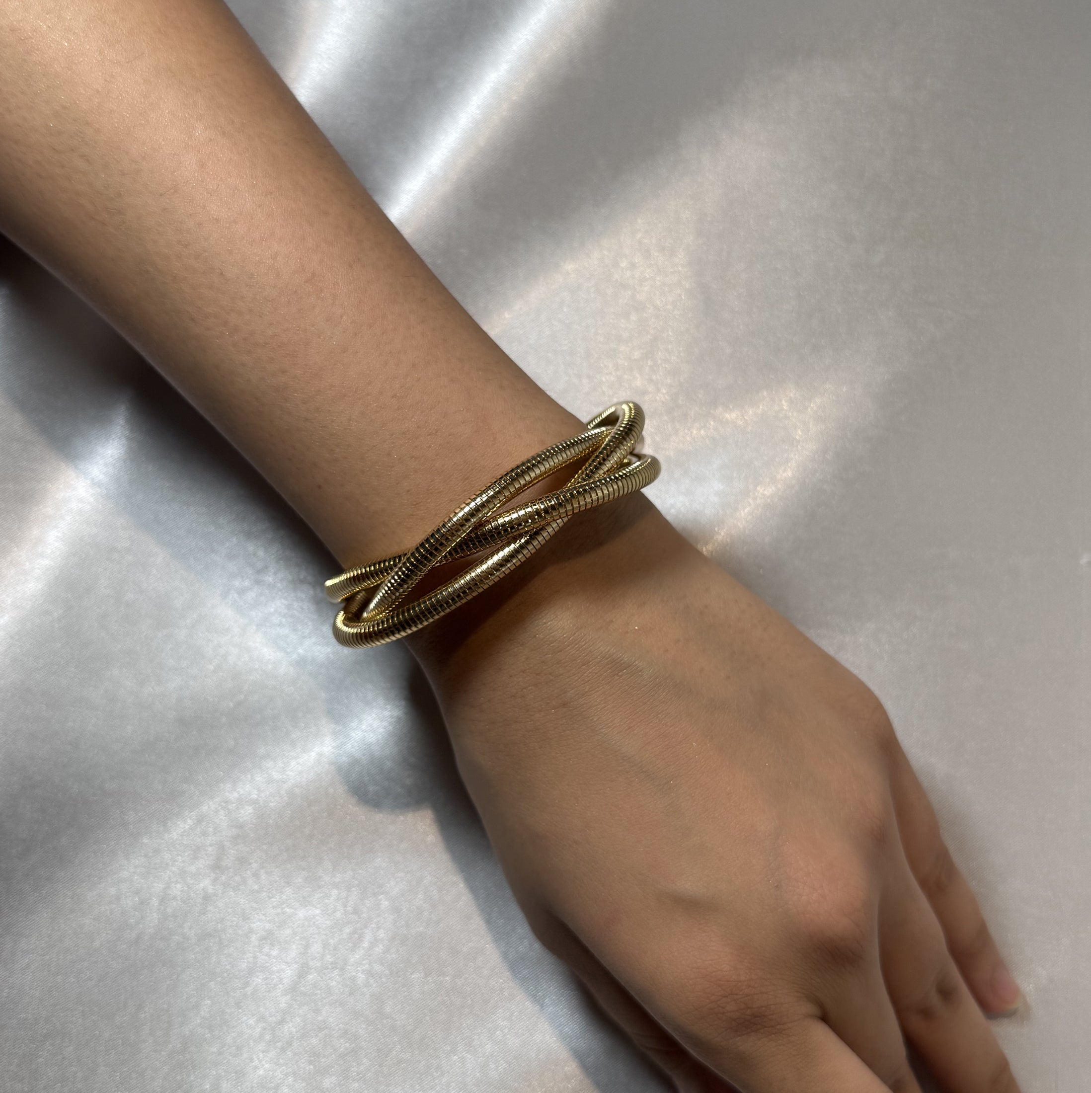 Twist and turn gold bracelet